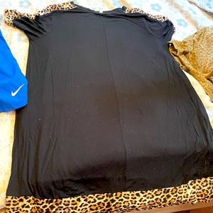 Boutique dress. Fits loose. Pretty leopard print on sleeves and bottom